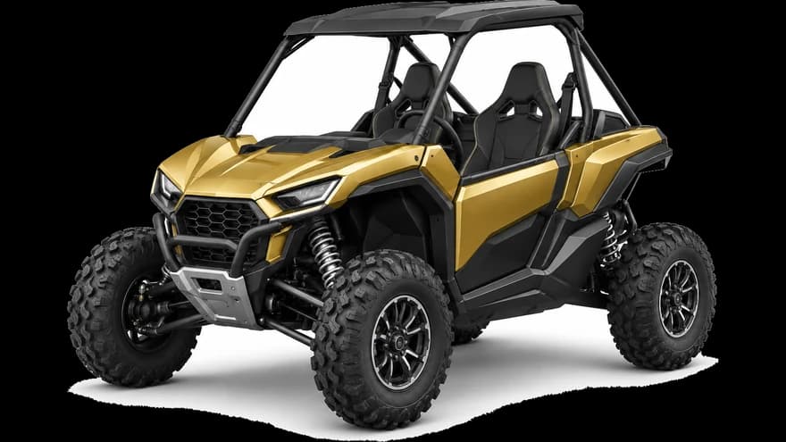 A gold side-by-side utility vehicle, front three-quarter view